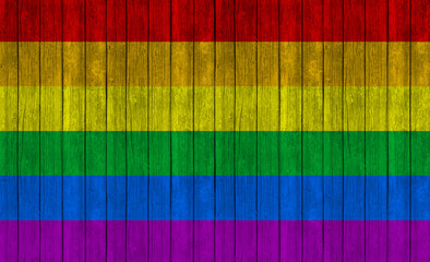 rainbow flag on wood texture background