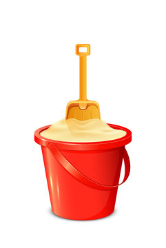 Bucket with shovel and sand