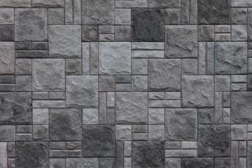 Photo sur Plexiglas Pierres un mur de pierre grise, texture.