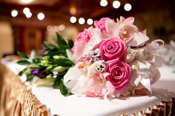 Beautiful bride's bouquet on the table in restaurant