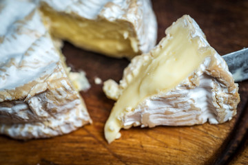 Close up of slice of  camembert cheese