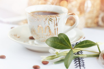 Cup of coffee with flowers