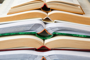Pile of open books