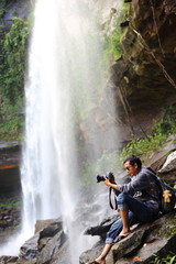Photography man and waterfall