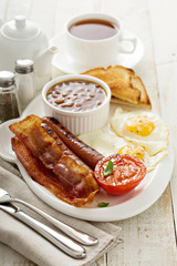 Full english breakfast with egg and bacon