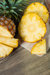 pineapple on the wood texture background