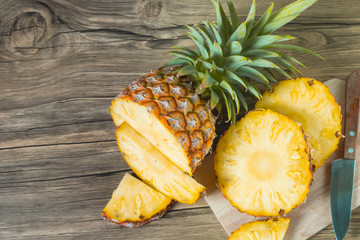 pineapple on the wood texture background