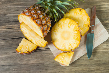 pineapple on the wood texture background