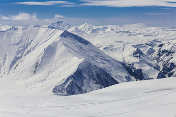 Panoramic view at snowy mountains