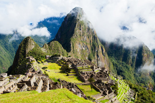 Misty clouds over Machu Picchu Peru