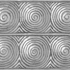 Fototapeta na wymiar metal pattern Crafts spiral coil wall in the temple of thailand