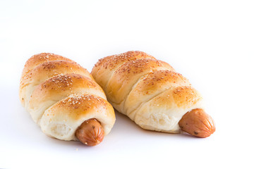 sausage dough on white background