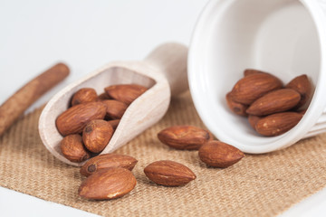 almonds in wood spoon