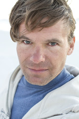 Man with messy wind blown hair