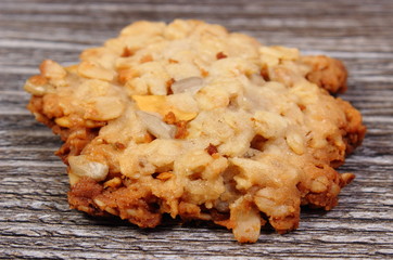 Oatmeal cookies on wooden background