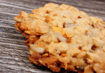 Oatmeal cookies on wooden background