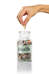 health  text, Hand putting a coin into jars.