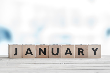 January sign on wooden cubes