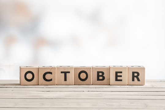 October sign made of wooden cubes
