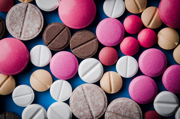 close up of colorful tablets