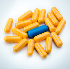 one blue and yellow capsules