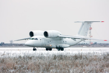 Taxiing rare aircraft in cold winter airport