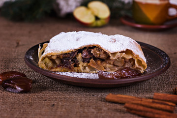 Apple strudel or apple pie  with dates and cinnamon