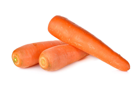 whole unpeeled fresh carrot on white background