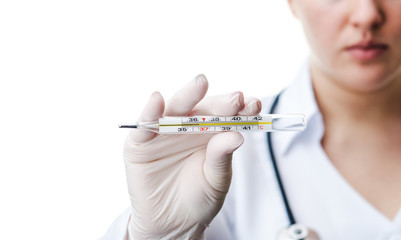 doctor holding thermometer