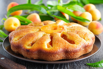 Pie with fresh peaches and almonds.