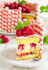 Waffle cake with raspberries and cream.