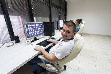 photo editor at his desk