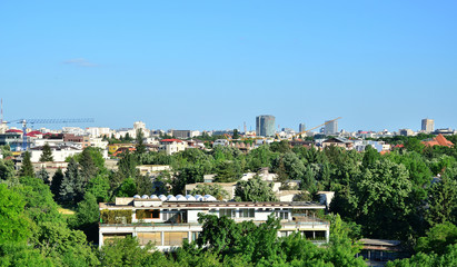 Fototapeta na wymiar Bucharest view in a spring day with a lot of green.