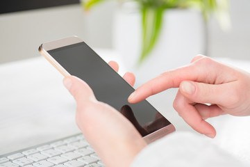Woman using mobile smart phone.