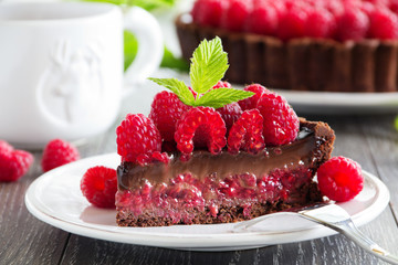 Chocolate tart with fresh raspberries.