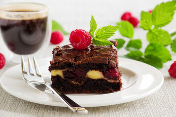 Chocolate brownie with raspberries and mascarpone.