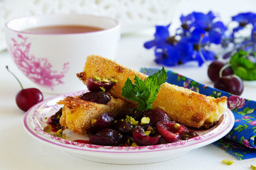 Fried brie with Cherry Sauce.