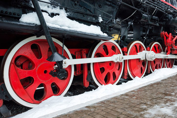 Old black steam locomotive wheels