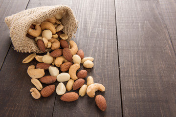 Almond, macadamia, peanut, cashew are in a suck bag