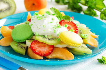 Fruity summer salad with meringue.