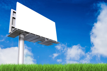 blank billboard on green grass with blue sky background