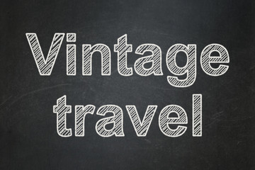 Tourism concept: Vintage Travel on chalkboard background