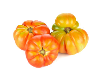 Fototapeta premium big red tomato RAF close-up isolated on white background