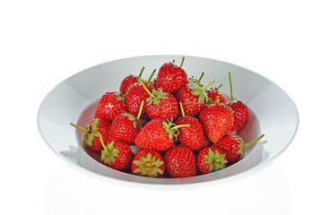 Strawberry on white plate on white background