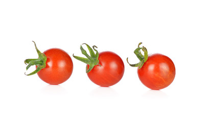 Fresh ripe cherry tomatoes isolated on a white background
