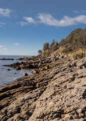 Rocky coastline at Jenny Brown's Point, Silverdale, Lancaster, Lancashire, UK