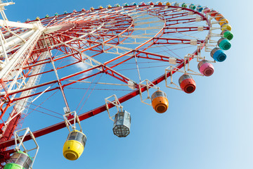 Big Ferris wheel with blue sky