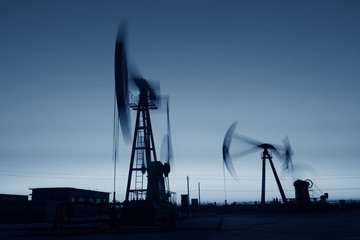 The beam pumping unit is homework, in the fields under the setti