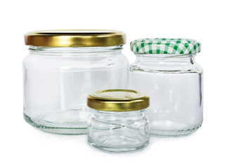 Set of empty jars on white background