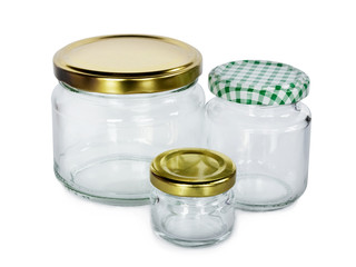 Set of empty jars on white background